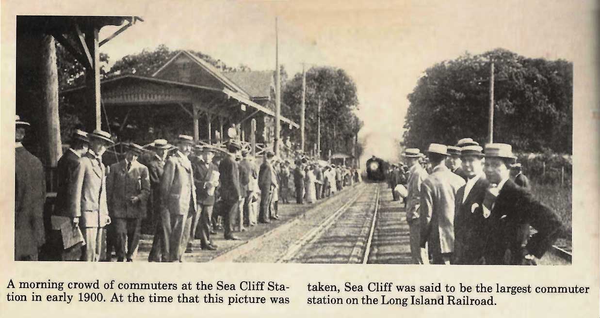 Sea-Cliff-Commuters-Station Black-and-white photo of a large group of commuters waiting at Sea Cliff Station, Long Island Railroad, in early 1900s. Train is approaching in the distance.