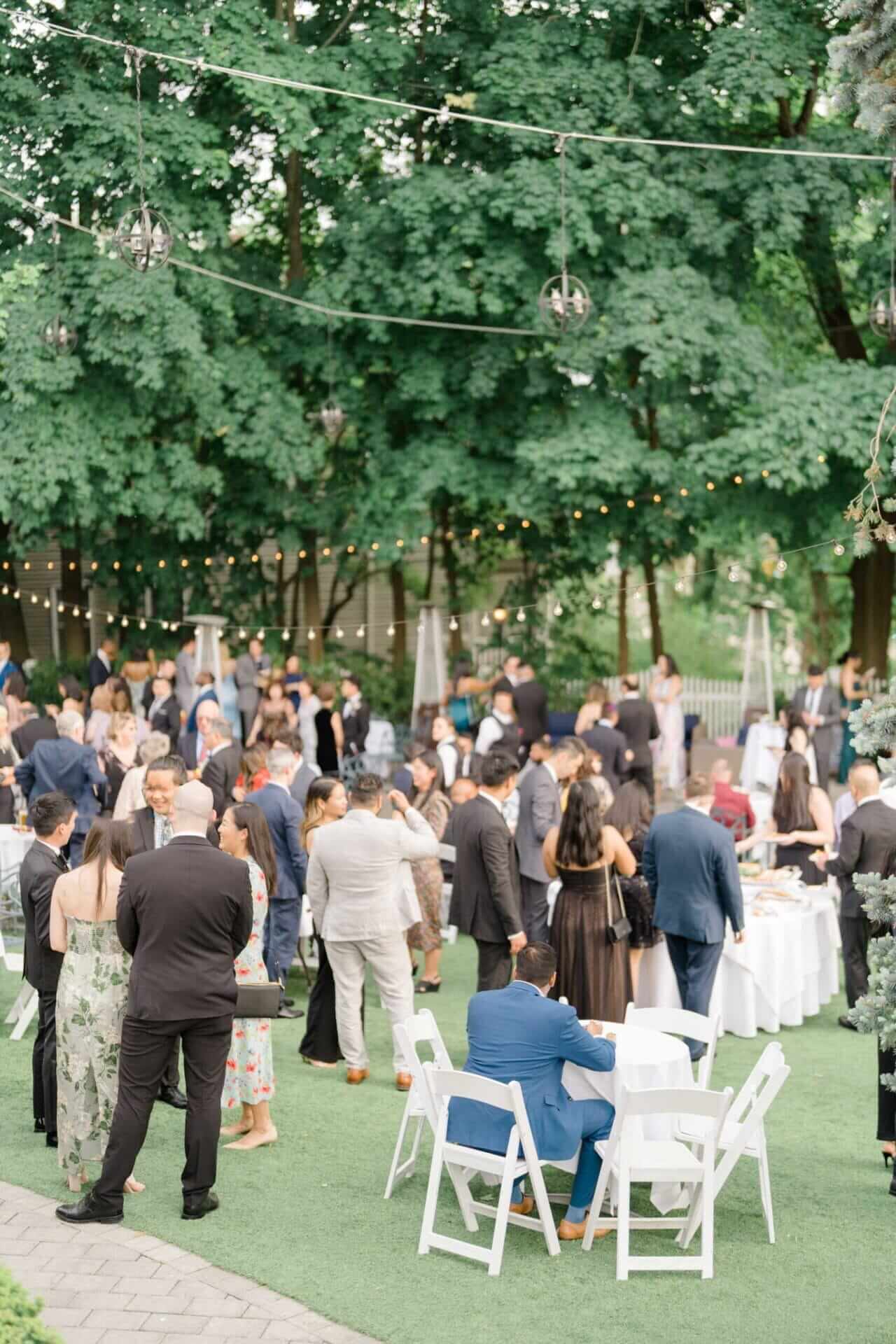 guests-at-sea-clif-manor-lawn A group of people in formal attire outside.